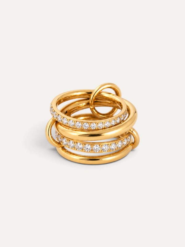 CÉLOIR Vermont Ring aus goldfarbenem Edelstahl mit funkelnden Zirkonia-Steinen in mehrlagigem Design